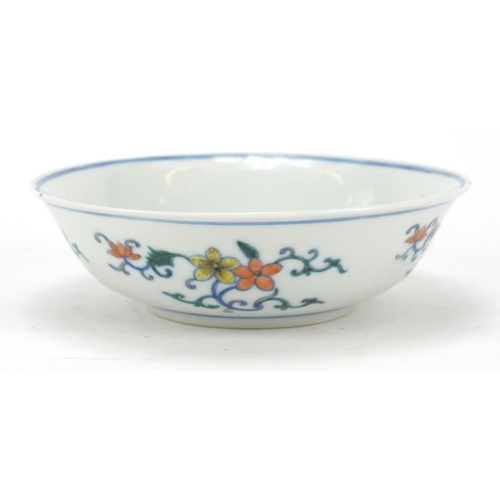 223 - Chinese doucai porcelain shallow bowl hand painted with flowers, six figure character marks to the b... 