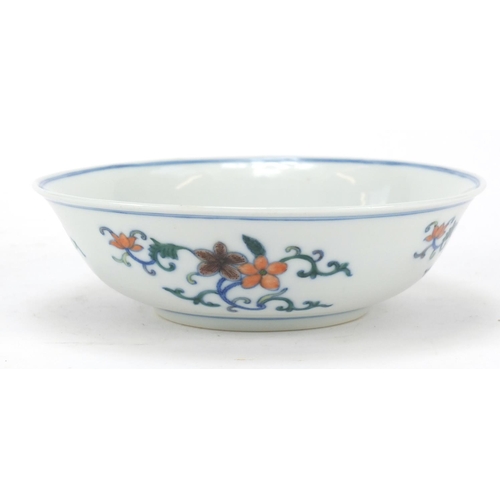 223 - Chinese doucai porcelain shallow bowl hand painted with flowers, six figure character marks to the b... 