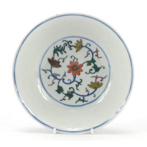 223 - Chinese doucai porcelain shallow bowl hand painted with flowers, six figure character marks to the b... 