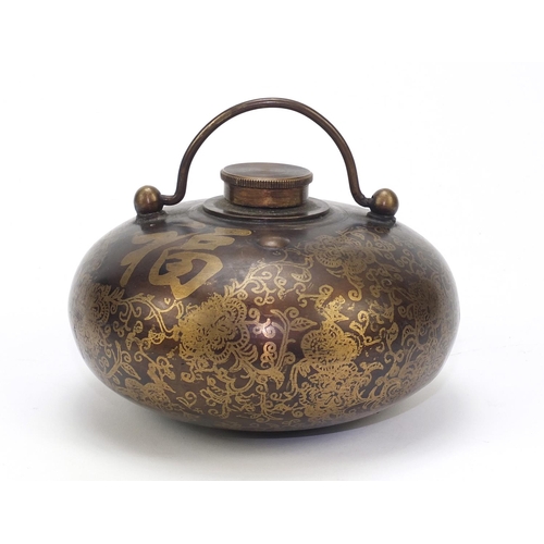 2180 - Chinese bronze hand warmer decorated with flowers and calligraphy, four figure character marks to th... 