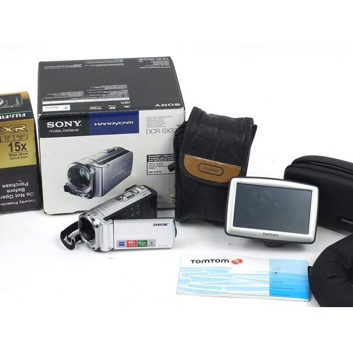 3043 - Two boxed digital cameras compriding Fujifilm and Sony, Tom Tom, sold as seen and not tested