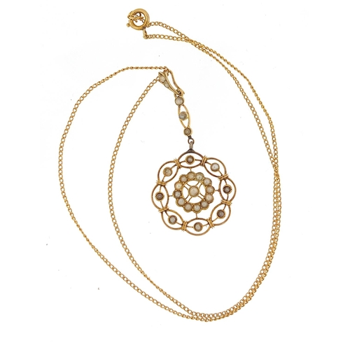 132 - 9ct gold seed pearl pendant on a 9ct gold necklace, housed in a velvet and silk lined fitted box, 5c... 