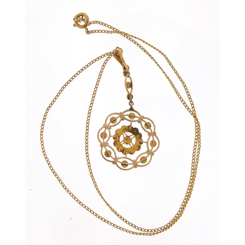 132 - 9ct gold seed pearl pendant on a 9ct gold necklace, housed in a velvet and silk lined fitted box, 5c... 