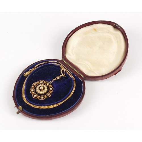 132 - 9ct gold seed pearl pendant on a 9ct gold necklace, housed in a velvet and silk lined fitted box, 5c... 