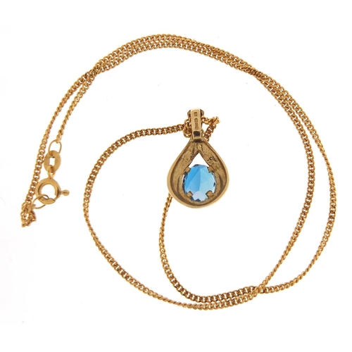 206 - 9ct gold blue topaz and diamond tear drop pendant on a 9ct gold necklace, 2cm high and 40cm in lengt... 