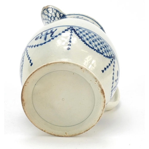 142 - Late 18th century pearlware jug hand painted with flowers, 17cm high