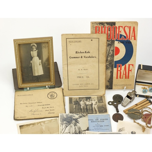 1357 - Militaria including two World War II medals, photographs and a Rhodesia and the RAF book