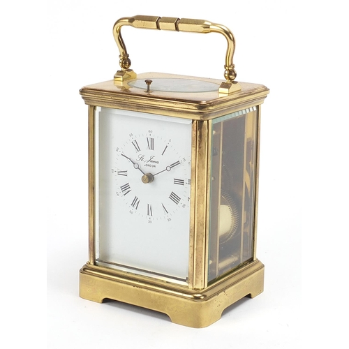 72 - S T James of London, large brass cased repeating carriage clock with enamel dial having Roman and Ar... 