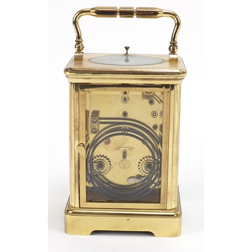 72 - S T James of London, large brass cased repeating carriage clock with enamel dial having Roman and Ar... 