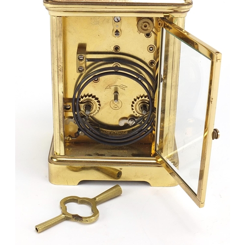 72 - S T James of London, large brass cased repeating carriage clock with enamel dial having Roman and Ar... 