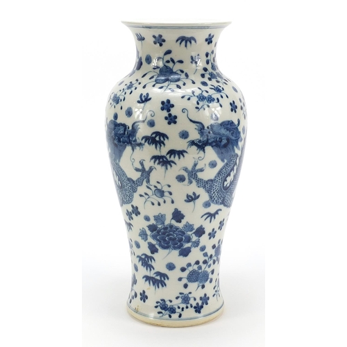 21 - Large Chinese blue and white porcelain vase hand painted with dragons amongst flowers, four figure c... 