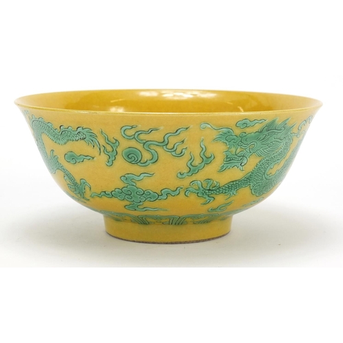 2175 - Chinese yellow ground porcelain bowl hand painted in green with dragons chasing a flaming pearl amon... 