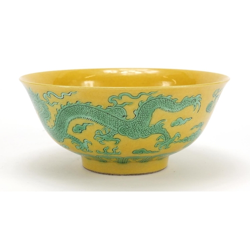 2175 - Chinese yellow ground porcelain bowl hand painted in green with dragons chasing a flaming pearl amon... 