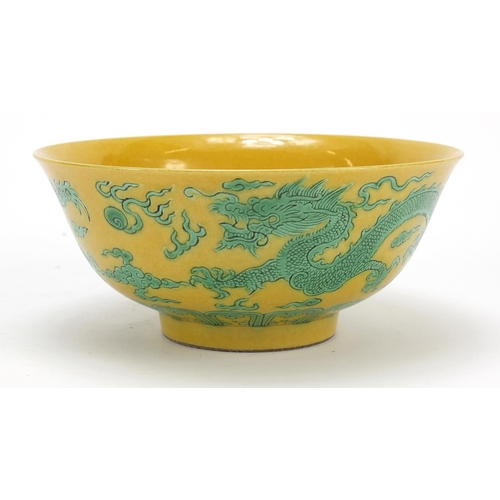 2175 - Chinese yellow ground porcelain bowl hand painted in green with dragons chasing a flaming pearl amon... 