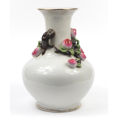 164 - Large Chinese porcelain vase decorated in relief with peaches, character marks to the base, 49cm hig... 