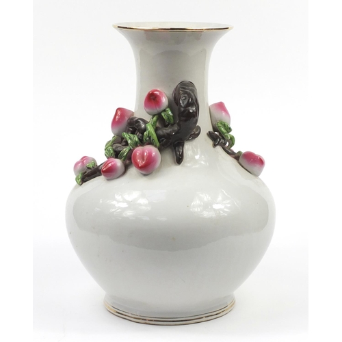 164 - Large Chinese porcelain vase decorated in relief with peaches, character marks to the base, 49cm hig... 