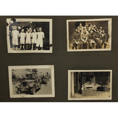 2199 - Military interest black and white photographs and postcards arranged in an album including Palestine... 