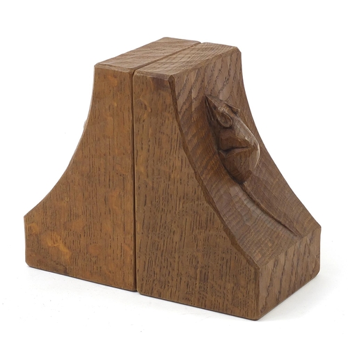 64 - Robert Mouseman Thompson, pair of adzed oak book ends, each carved with a mouse, each 15.5cm high