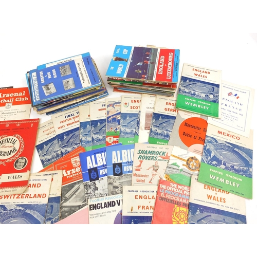 2188 - Collection of 1950's and later football programs and a cricket related autograph album including Tot... 