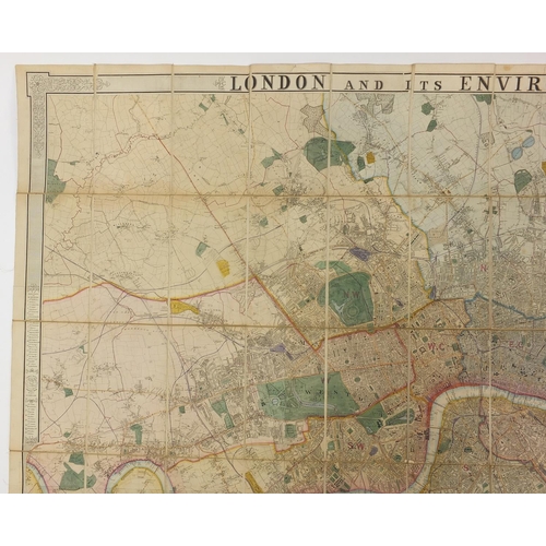 2198 - 19th century canvas backed hand coloured folding map titled Environs of London by James Wild with sl... 