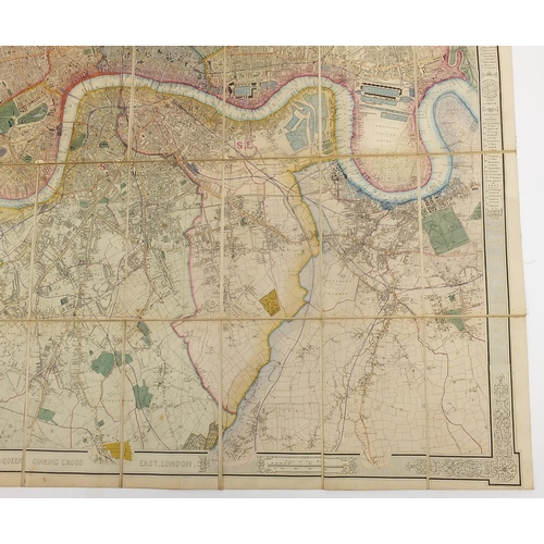 2198 - 19th century canvas backed hand coloured folding map titled Environs of London by James Wild with sl... 