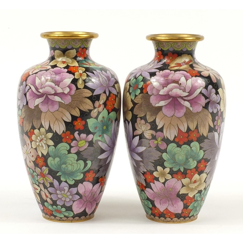 176 - Pair of Chinese cloisonné vases enamelled with flowers, each 24cm high