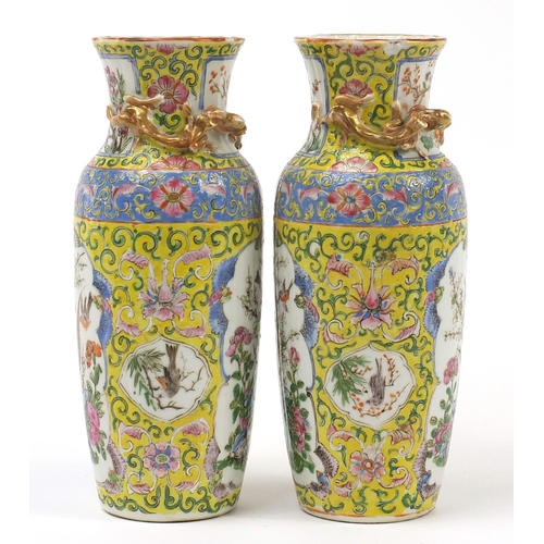 221 - Pair of Chinese porcelain yellow ground vases decorated in relief with water dragons, each hand pain... 