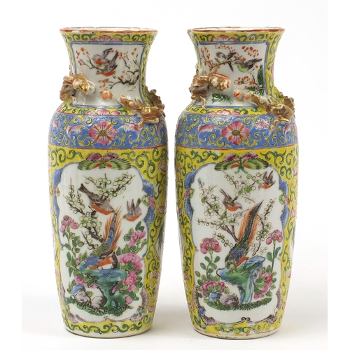 221 - Pair of Chinese porcelain yellow ground vases decorated in relief with water dragons, each hand pain... 