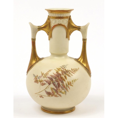 52 - Royal Worcester, Victorian blush ivory vase with twin handles decorated and gilded with flowers, num... 
