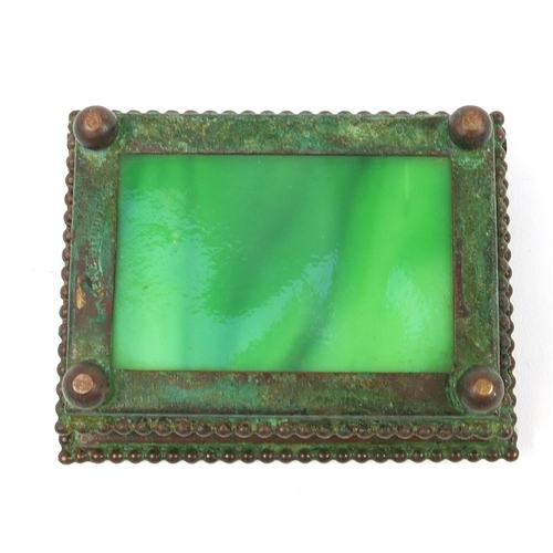 68 - Riviera Studios, American Art Nouveau bronze and slag glass double stamp box on ball feet, 8.5cm wid... 