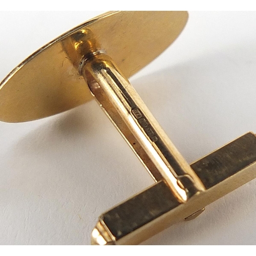 238 - Pair of 9ct gold cufflinks with engraved decoration, 2cm in length, 6.2g
