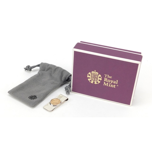39 - Elizabeth II 2020 gold half sovereign silver money clip with box, by the Royal Mint, 5.2cm in length... 