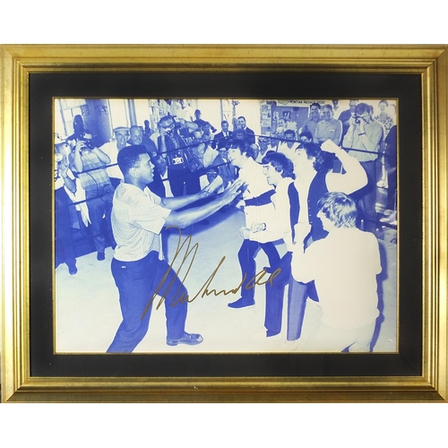 2185 - Mohammed Ali and The Beatles black and white photograph signed in gold ink by the boxer Mohammed Ali... 