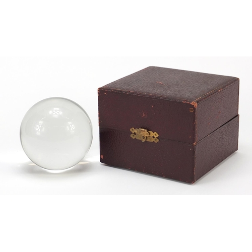 122 - Victorian crystal ball housed in a velvet lined fitted leather case, printed Two Worlds Ltd Manchest... 