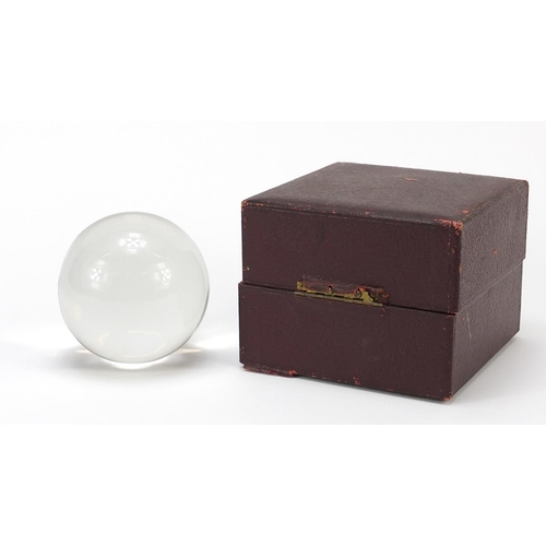 122 - Victorian crystal ball housed in a velvet lined fitted leather case, printed Two Worlds Ltd Manchest... 