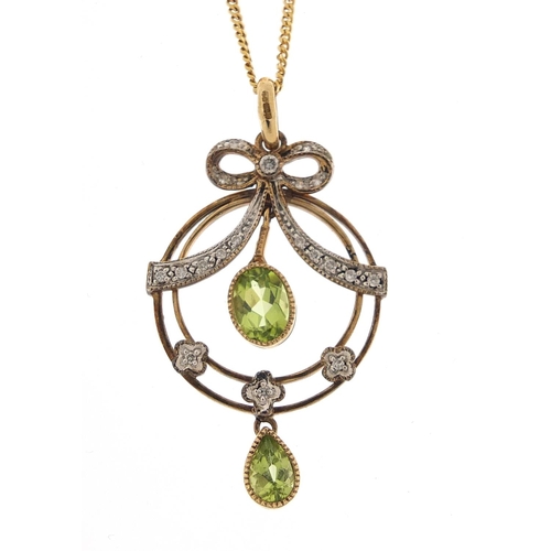 35 - Art Nouveau 9ct gold peridot and diamond pendant on a 9ct gold necklace, housed in a Victorian velve... 