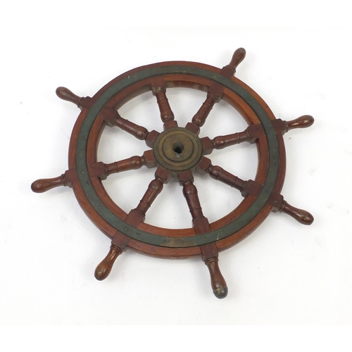 128 - Large mahogany ship's wheel with brass mounts, 90.5cm in diameter