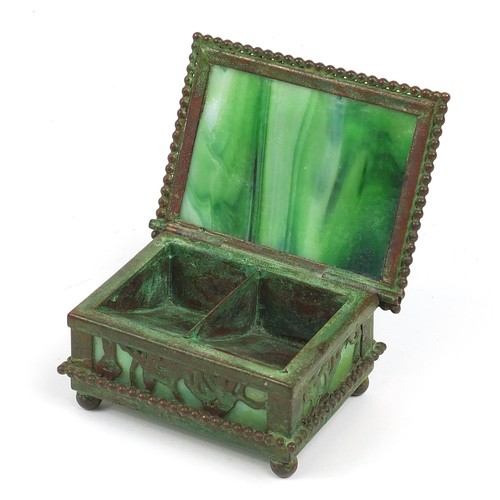 68 - Riviera Studios, American Art Nouveau bronze and slag glass double stamp box on ball feet, 8.5cm wid... 