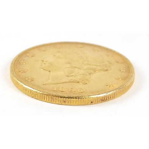 320 - United States of America 1899 gold twenty dollars, Liberty head to the reverse, 33.6g - this lot is ... 