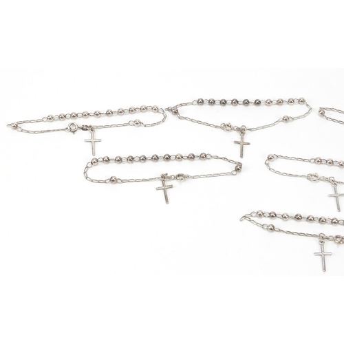 936 - Eight rosary bead design silver bracelets, 22.0g