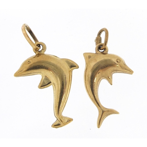 782 - Two 9ct gold dolphin pendants, 2.6cm and 2.2cm high, total 1.2g