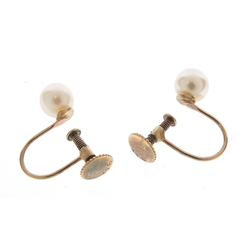 597 - Pair of 9ct gold pearl earrings with screw backs, 1.5cm high, 1.3g