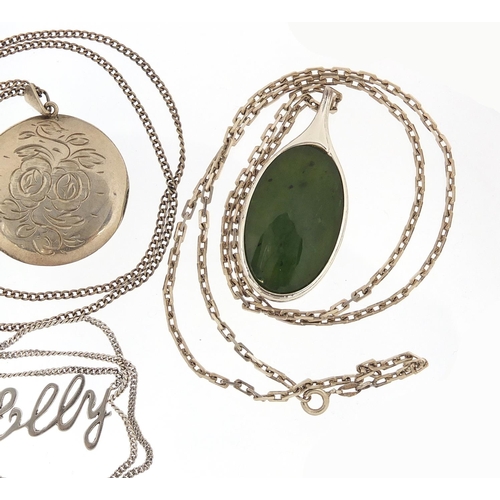 1202 - Four silver pendants on silver necklaces including a circular locket and jadeite, 53.8g