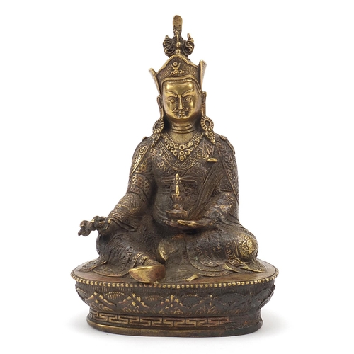 245 - Chino-Tibetan bronzed figure of seated Buddha, 20cm high
