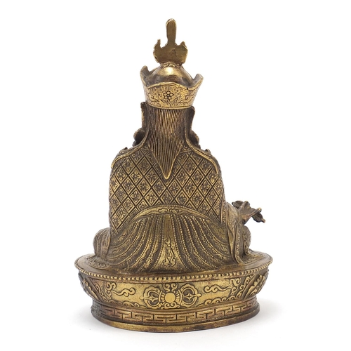245 - Chino-Tibetan bronzed figure of seated Buddha, 20cm high