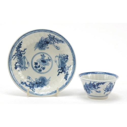 99 - Chinese blue and white porcelain tea bowl with saucer, hand painted with phoenixes, the saucer 12.5c... 