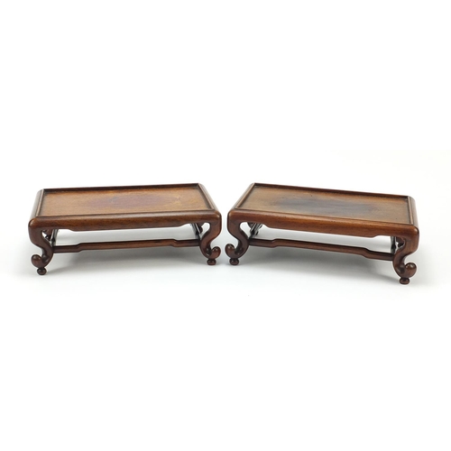 235 - Pair of Chinese carved hardwood stands, each 8cm H x 24.5cm W x 15.5cm D