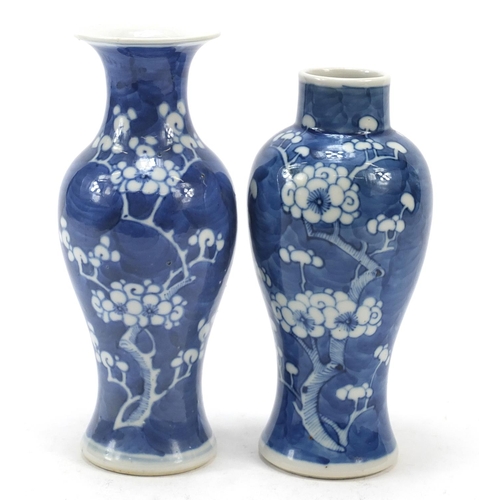 89 - Two Chinese porcelain blue and white porcelain vases hand painted with prunus flowers, each with blu... 