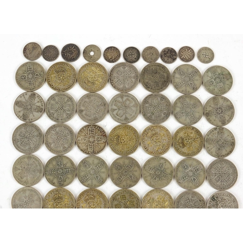 884 - British pre decimal coinage including florins and two shillings, 487g