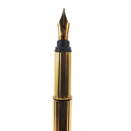 23 - Cartier gold plated fountain pen with 18k gold nib, serial number 119339